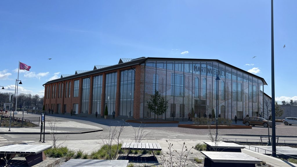 Martinverket på Vårvik. Stora fönsterpartier, entré i glas och tegel samt tegelfärgad puts.